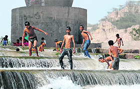 The ban has failed to deter children from entering the Ghaggar River