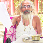 Matra Sadan founder Swami Shivanand Saraswati shows a copy of the CBI closure report at Jagjeetpur in Haridwar on Thursday. Tribune photo: Rameshwar Gaur