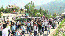 Protesters hold a rally in Bhaderwah on Thursday.
