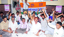 Members of the Uttar Railway Mazdoor Union stage a dharna