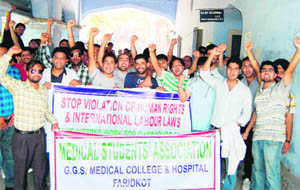 MBBS students hold a protest at Government Medical College in Amritsar on Friday. 