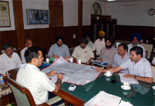 District officials (above) at the meeting with MC & PWSSB officials.