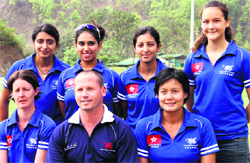 Hong Kong cricket team members along with their coach Charles Burke at the Abhimanyu Cricket Academy in Dehradun. Tribune photo: Vinod Pundir