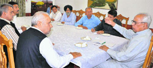 Governor NN Vohra during a meeting with a delegation of the Panchayat Conference at Raj Bhawan on Friday.
