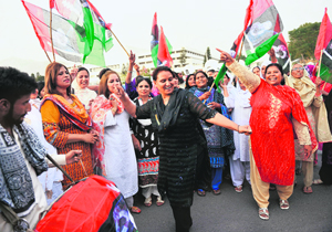 Pakistan Peoples Party supporters celebrate the election of Raja Pervez Ashraf as Pakistans PM in Islamabad.