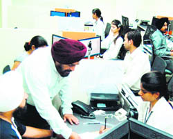 Regional Passport Officer JS Sodhi on the first day of the passport mela organised in Amritsar on Saturday. 