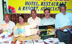 Urmila Khosa of the state tourism department along with the members of the Hotel, Restaurant and Resort Association, Bathinda, at a meeting held on Saturday. Tribune photo: Pawan Sharma