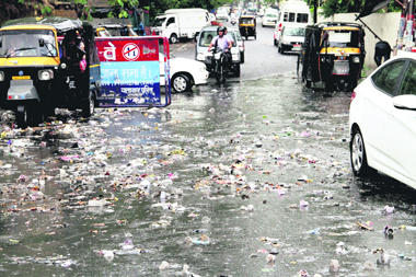 Heaps of garbage could be seen on roads after the rain.