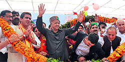 Union Minister Virbhadra Singh with his son Vikramaditya Singh and other party leaders in Shimla on Saturday