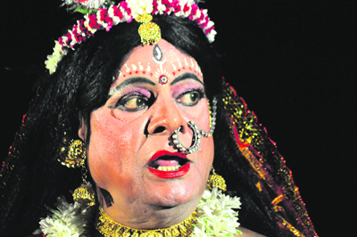 Chapal Bahaduri enacts a monologue of Goddess Shitala during a recent performance in Kolkata. 