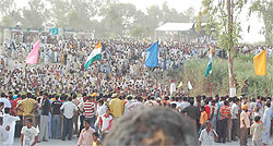 People from both the countries gather at the Sadqi JCP on Independence Day to have a glimpse of their segregated relatives