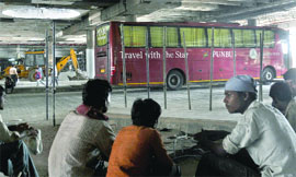 Some workers at the Kashmere Gate ISBT.