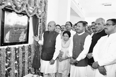 Chief Minister PK Dhumal inaugurates a newly constructed building at Solan on Sunday.