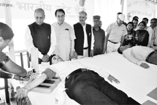 Chief Minister Prem Kumar Dhumal at a blood donation camp in Shimla on Sunday. 