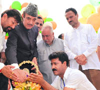 Union Minister for Health and Family Welfare Ghulam Nabi Azad lights a traditional lamp to inaugurate the Bhaderwah festival on Sunday. 