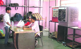 New coolers  that were bought for the night shelter lying in the background at the bus stand in Ludhiana. 