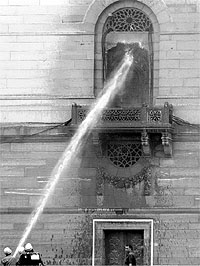 Firefighters douse a fire at the Home Ministry in North Block in New Delhi on Sunday