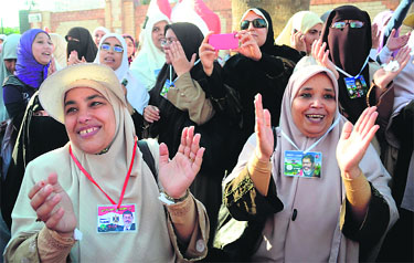Supporters of Egypts Muslim Brotherhood candidate Mohamed Morsi celebrate after Egypt's elections presidential committee declared Morsy as the winner. 