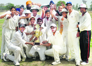 The BECC team poses with the trophy after defeating Mahamaya Club in Patiala. 