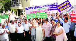 Members of the IMA, Rohtak branch, protest against the Union Health Ministers proposal of amendments in various Bills related to the health sector in Rohtak