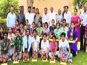 Students with Sonepat MP Jitender Singh Malik, VC Pankaj Mittal and others at the Gohana Press Club office. Photo: BS Malik