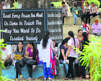 Students outside a NET examination centre in Jammu. 