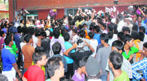 Hordes of students flood the counters at the PSEB book depot in Jalandhar on Monday. 