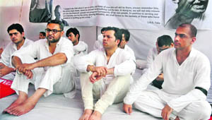 Striking Air India pilots at Jantar Mantar in New Delhi on Monday. 