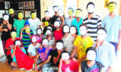 Students show the masks prepared by them during the NSD theatre workshop at Virsa Vihar in Amritsar on Tuesday. photo: Sameer Sehgal 