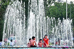 Children having fun at a fountain running on electricity, unaware of the danger. This moment was captured on the road separating Sectors 40 and 55, in Chandigarh, on Tuesday