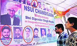 A poster has pictures of former PUSU and SOPU leaders, who later joined the NSUI