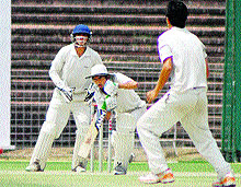Cricket match between Chandigarh and Amritsar in progress at Sector 16, Chandigarh, on Tuesday