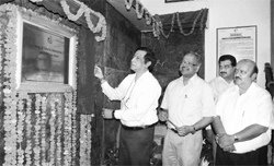 Chief Secretary Sudripta Roy inaugurates a coffee shop at the Tourist Information Centre in Shimla on Tuesday.