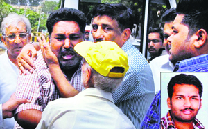 Relatives of Neeraj (inset), who died of cardiac arrest in Baltal, mourn his death in Jalandhar.