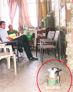 Employees use an electric heater to make tea at the MC office at Mata Rani Chowk, Ludhiana. Photo: Inderjeet Verma