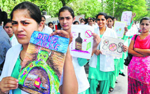 Nursing students at an anti-drug awareness rally in Patiala: and (below) policemen at the rally.