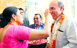 Chairman of the Board and Global CEO of Coca-Cola Muhtar Kent gets a traditional welcome during a visit to a mall in Amritsar on Wednesday