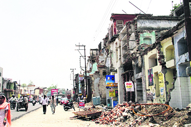 The buildings that were partially demolished during the widening of Chakrata Road in Dehradun.