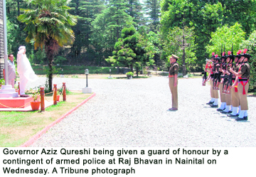 Governor Aziz Qureshi being given a guard of honour by a contingent of armed police at Raj Bhavan in Nainital on Wednesday.