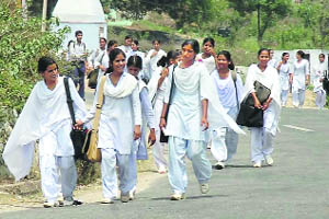 A file photo of students coming out of a school. A Red Cross survey has painted a dismal picture of the average health of students in Jammu district.