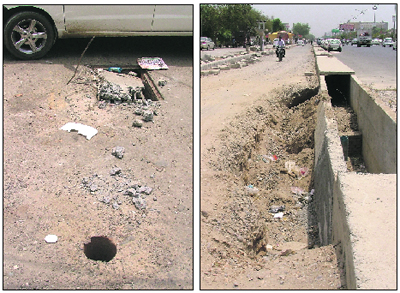 Potholes dot the Feroze Gandhi Market and (right) a portion of the road that caved in on the service lane along the Ferozepur Road in Ludhiana.