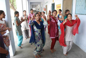 Girls take part in a dance event at a summer camp organised in the city recently. 