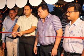Bathinda Deputy Commissioner Kamal Kishor Yadav inaugurates a new eatery at the local Dunes Club on Thursday evening. 