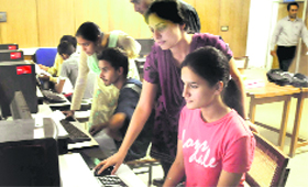 Aspiring BCom candidates submit online admission forms at the Panjab University computer centre in Chandigarh on Thursday.