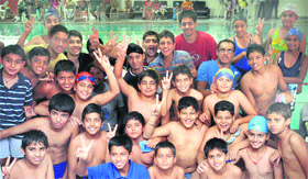 Winners of the Junior and Sub-Junior Swimming Championship (Boys and Girls) are all smiles in Chandigarh on Thursday.