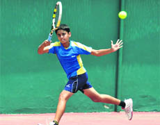 A player in action in the All-India Talent Series Tennis Tournament in Dehradun on Thursday. 