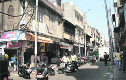 Haphazard parking of vehicles blocks the movement of traffic in Kanak Mandi-Rajinder Bazar, one of the oldest markets of Jammu. Tribune photo: Inderjeet Singh