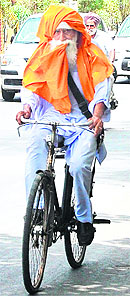 An elderly man cycles his way on a hot afternoon in Amritsar on Friday