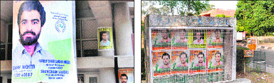 Posters of student leaders deface the pillars of the social work department and (right) the guide map in front of the arts block number 1, Panjab University, Chandigarh.