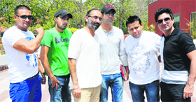The director of the movie Harjit Singh Ricky (third from left) poses with the other cast members